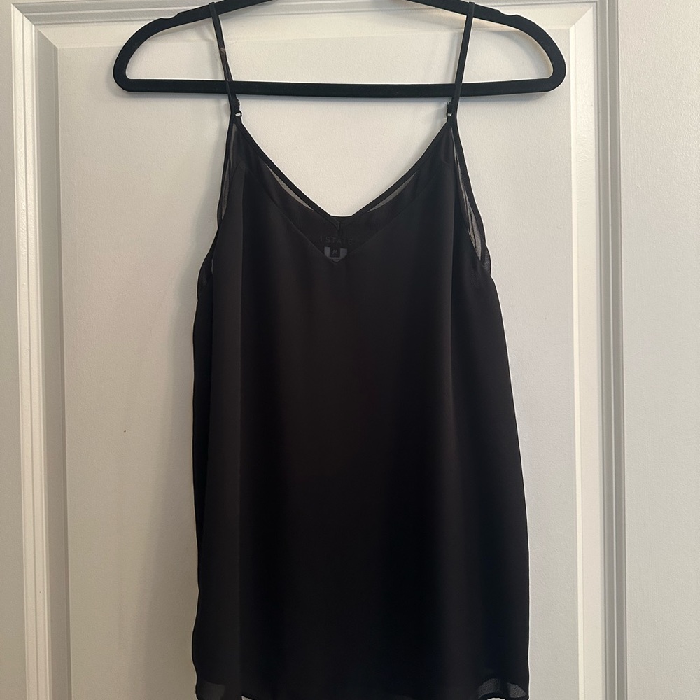 1. State black tank. M, has mesh along the v neck line
